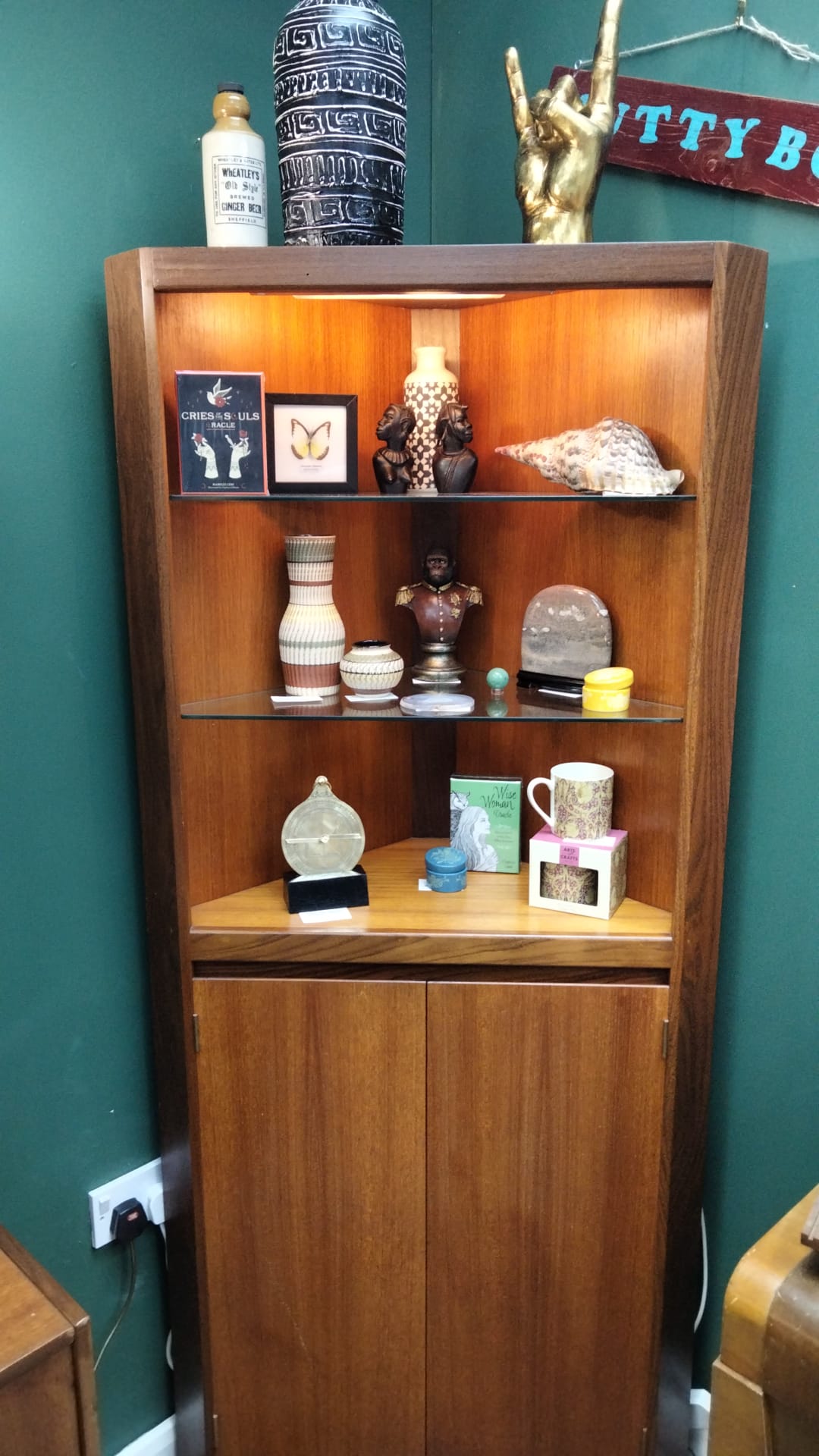 Illuminated mid century corner cabinet