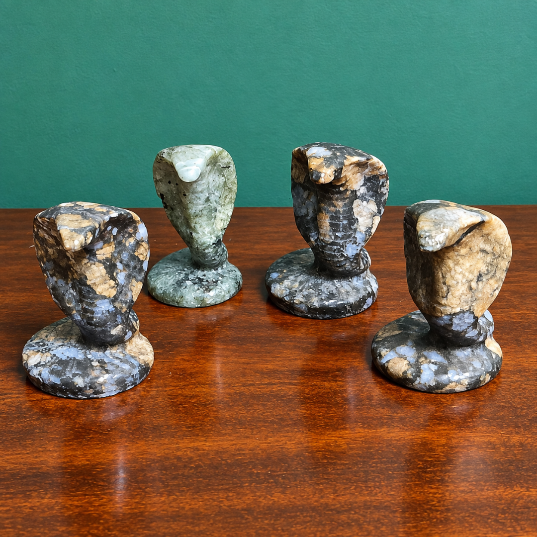Assorted Crystal Cobra carvings by Gaia Soul