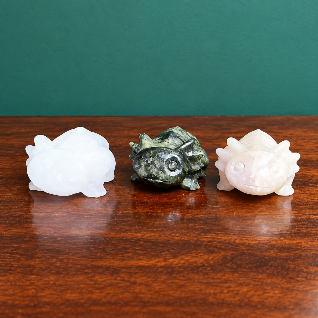 Carved crystal axolotls by Gaia Soul