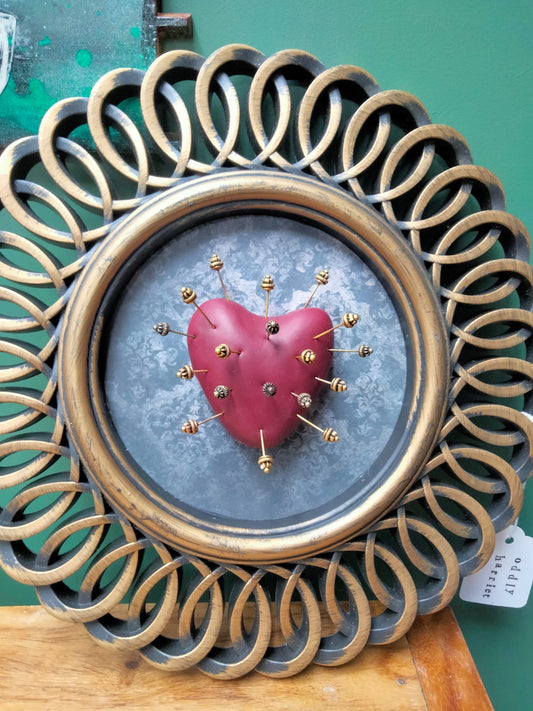 Spiral framed Stuck heart
