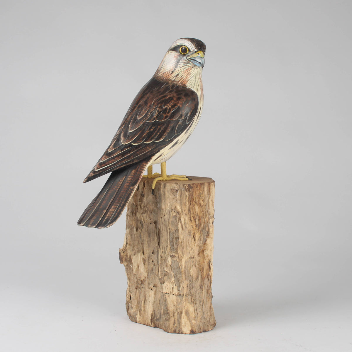 Hand Carved Kestrel on Post by Archipelago