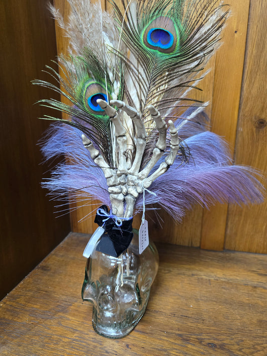 Large glass skull with feathers by Oddly Harriet