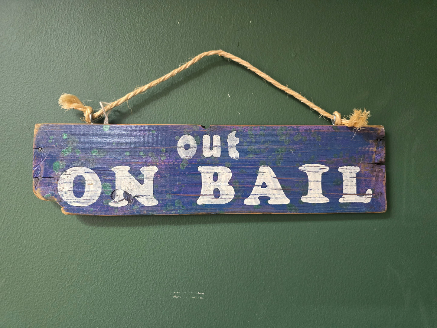Blue Out on bail sign by Bongo Jesus
