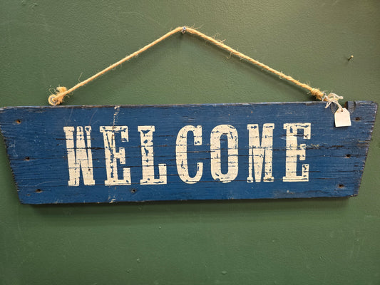 Blue Welcome Sign by Bongo Jesus